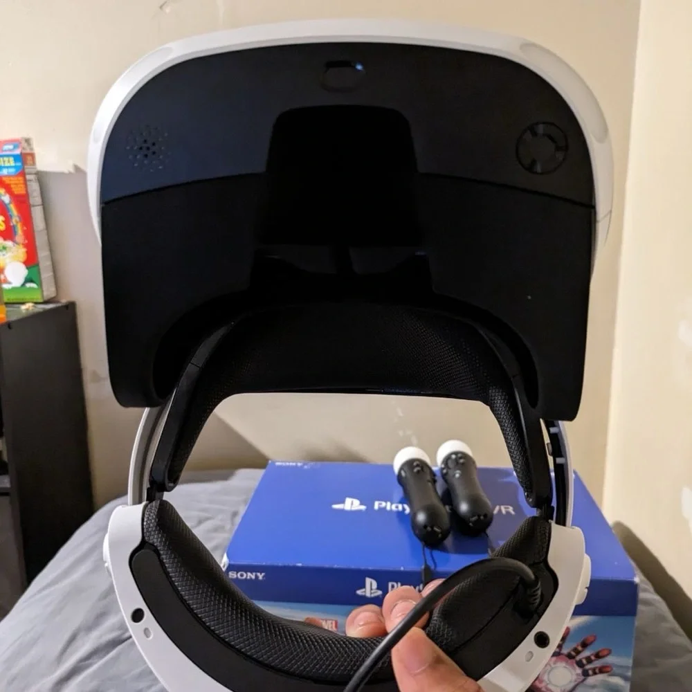 hardly used VR with the two controllers and all the cords with Spider-Man VR
